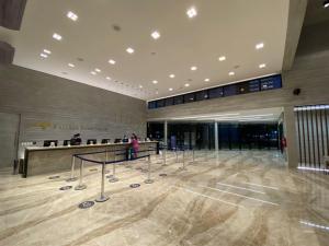 a lobby of a building with a check in counter at Salinas Premium Resort in Salinópolis +42 photos