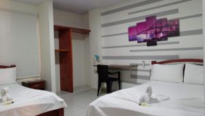 Un ou plusieurs lits dans un hébergement de l'établissement Hotel Villareal del Llano