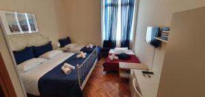 Postel nebo postele na pokoji v ubytování Napol-In