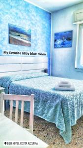 Łóżko lub łóżka w pokoju w obiekcie B&B Hotel Costa Azzurra