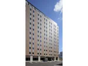 a rendering of a large white building at Center Hotel Narita 2 R51 - Vacation STAY 43395v in Narita