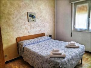 Posteľ alebo postele v izbe v ubytovaní B&B Hotel Costa Azzurra