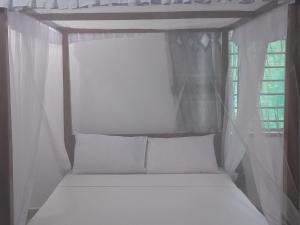 Ένα ή περισσότερα κρεβάτια σε δωμάτιο στο The New Muna House - 2 bedroom ensuite house. +27 φωτογραφίες