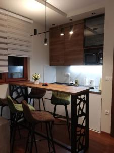 Η κουζίνα ή μικρή κουζίνα στο Aura Analux Apartmani