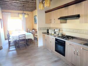 Kuchyň nebo kuchyňský kout v ubytování Casa Rua