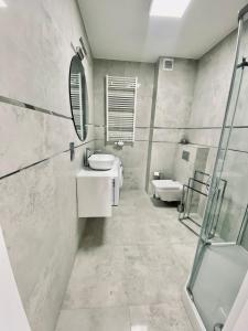 Łazienka w obiekcie Fredry 2 Apartament Liliowy