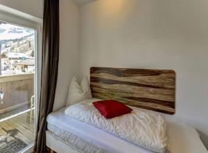 A bed or beds in a room at Alm'a Residence