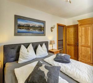 A bed or beds in a room at Alm'a Residence