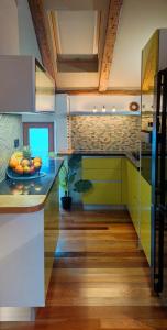 a kitchen with a bowl of fruit on a counter at GreatStay - with free parking in center in Pula