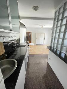 Kuchyňa alebo kuchynka v ubytovaní Casita rosa + 30 fotografií