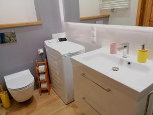 Kúpeľňa v ubytovaní Apartament Pod Papugami Karpatia Resort