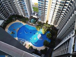 an overhead view of a swimming pool in a city at Golden House-Atlantis Residence in Malacca