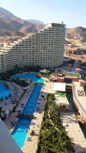 an aerial view of a large hotel with a resort at شاليهات بورتو السخنة عائلات in Ain Sokhna