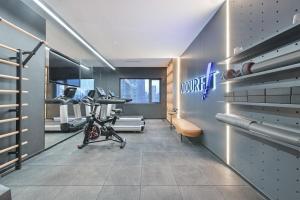 a fitness room with a gym with a treadmill at Atour Hotel Beijing Hepingli UIBE in Beijing