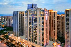 a view of a large city with tall buildings at Atour Hotel Lanzhou Anning Zhonghai Plaza in Lanzhou