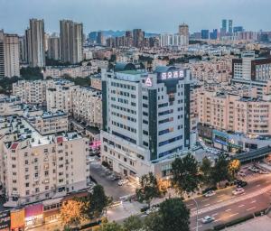 an aerial view of a city with buildings at Atour Hotel Qingdao CBD Hangzhou Road in Qingdao