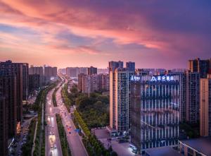 a view of a city with buildings and traffic at Atour Changsha Xingsha in Changsha