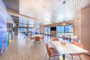 Χώρος καθιστικού στο Atour Hotel Rizhao Dongyi Town