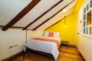 Postel nebo postele na pokoji v ubytování Hotel Posada del Rey