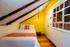Postel nebo postele na pokoji v ubytování Hotel Posada del Rey