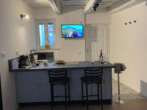 Kuchyňa alebo kuchynka v ubytovaní CASA ENEA TERRACINA - Relax Sauna Apartment