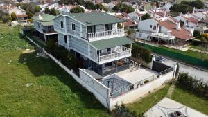 an aerial view of a large house with a yard at Rizk Villa sea view villa in silivri , istanbul in Silivri