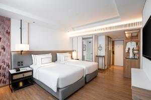 清迈美利亚酒店 (Melia Chiang Mai)客房内的一张或多张床位