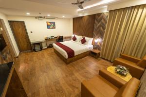 Postel nebo postele na pokoji v ubytování Clarks Inn , Airport Bangalore