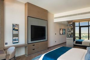 Uma TV ou centro de entretenimento em Paramount Hotel Midtown