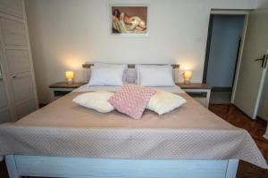 Postel nebo postele na pokoji v ubytování House Nada apartman
