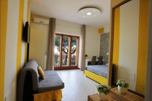 Postel nebo postele na pokoji v ubytování Guest House Le Tre Isole Sorrento