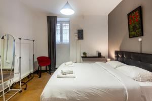 Posteľ alebo postele v izbe v ubytovaní Charming apartment in the heart of Plaka