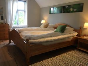 Postel nebo postele na pokoji v ubytování Solbacka