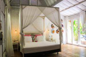 Letto o letti in una camera di Chanteak Bali