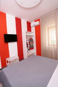Postel nebo postele na pokoji v ubytování Guest House Le Tre Isole Sorrento