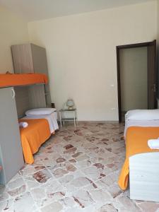 Posteľ alebo postele v izbe v ubytovaní Casa Mia, vacanze