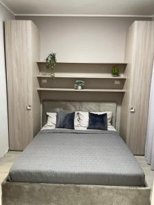 Postel nebo postele na pokoji v ubytování Appartamento nuovo super accessoriato sul mare