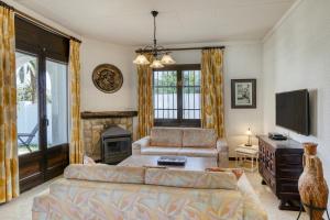 A television and/or entertainment centre at Villa Tordera