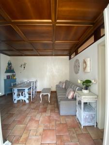 a living room with a couch and a table at La Rondine in Trento