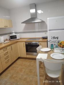 Kuchyňa alebo kuchynka v ubytovaní apartamento melide