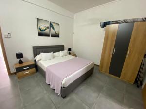 Voodi või voodid majutusasutuse Dragon Nest Apartments toas +4 fotot