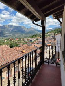 a view from the balcony of a house at Casa Rural El Mirador del Pico in Santa Cruz del Valle