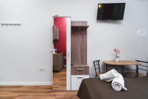 TV a/nebo společenská místnost v ubytování Grace Apartments