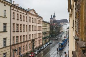 Nespecifikovaný výhled na destinaci Krakov nebo výhled na město při pohledu z apartmánu