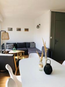 Posezení v ubytování Appartement C 2 chambres très lumineux