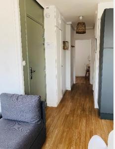 Posezení v ubytování Appartement C 2 chambres très lumineux