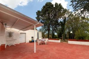 A balcony or terrace at Trulli da Rosy