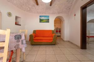 A seating area at Trulli da Rosy