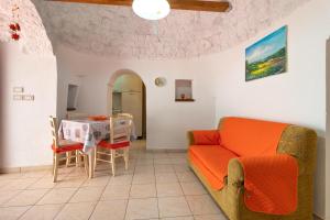 A seating area at Trulli da Rosy