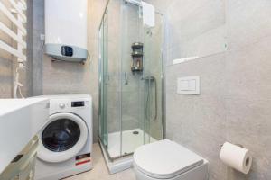 Koupelna v ubytování Nature Vibe Apartment at Šventosios Vartai + 27 fotografií